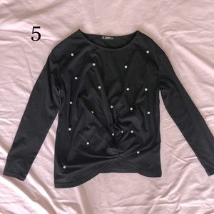 Black long-sleeve shirt with pearl details